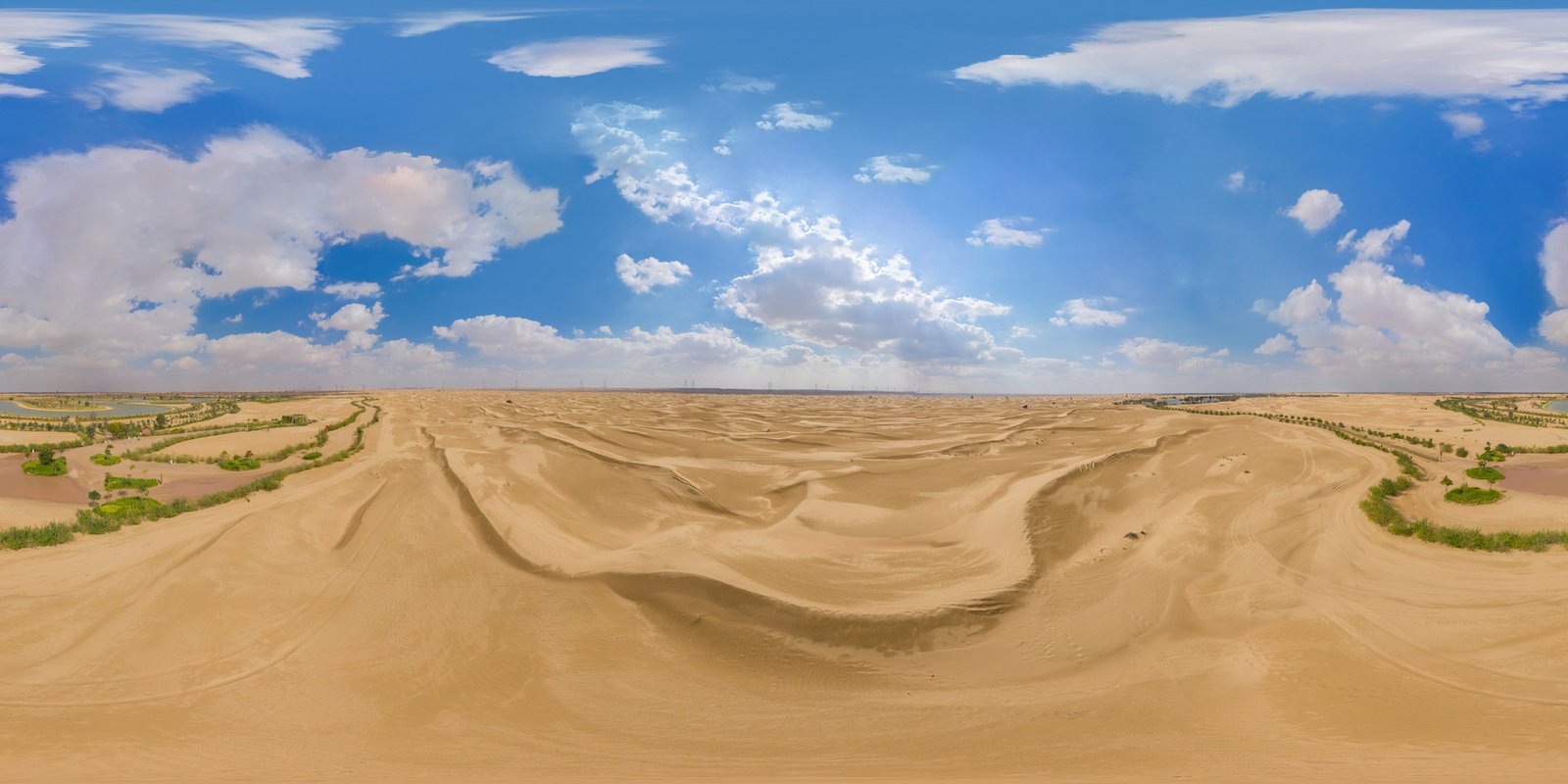 Panorama of aerial top view of love lake and sand desert, in Al Qudra in Dubai, United Arab Emirates